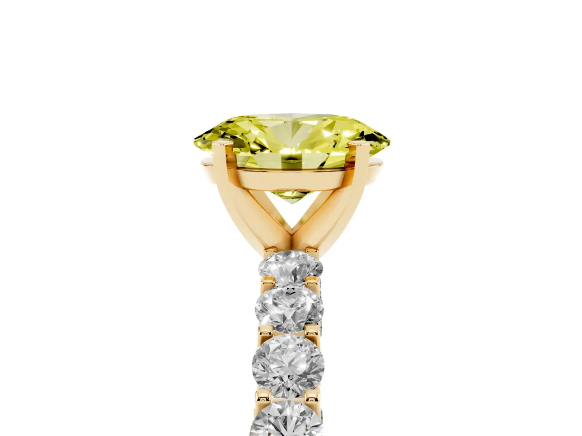 Fancy Yellow Oval Cut Diamond Solitaire Ring with Shared Prong Pavé Band and Four-Prong Setting Yellow gold