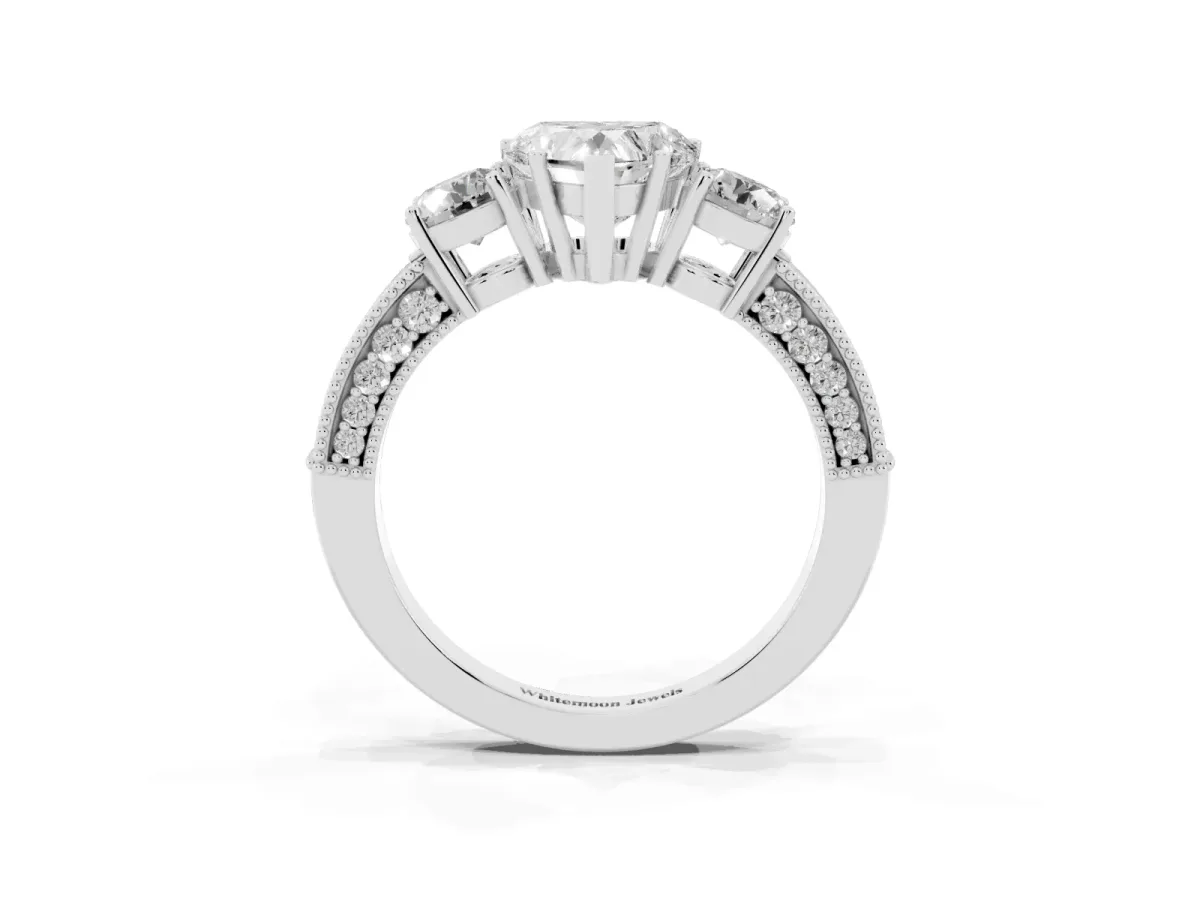Heart Cut Three-Stone Diamond Ring with Pavé Band and Four-Prong Setting Silver