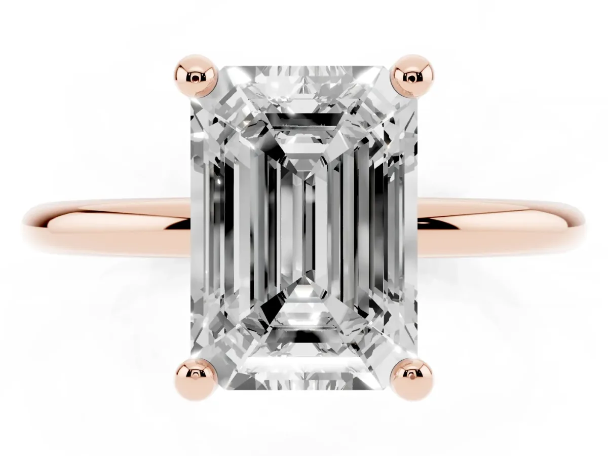 Emerald Cut Solitaire Diamond Ring with 4-Prong Setting on a Classic Band Rose gold