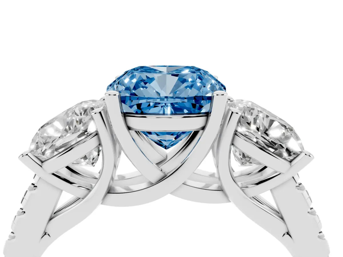 Fancy Blue Three-Stone Cushion Cut Diamond Ring with Round Pavé Band and Prong Setting Silver