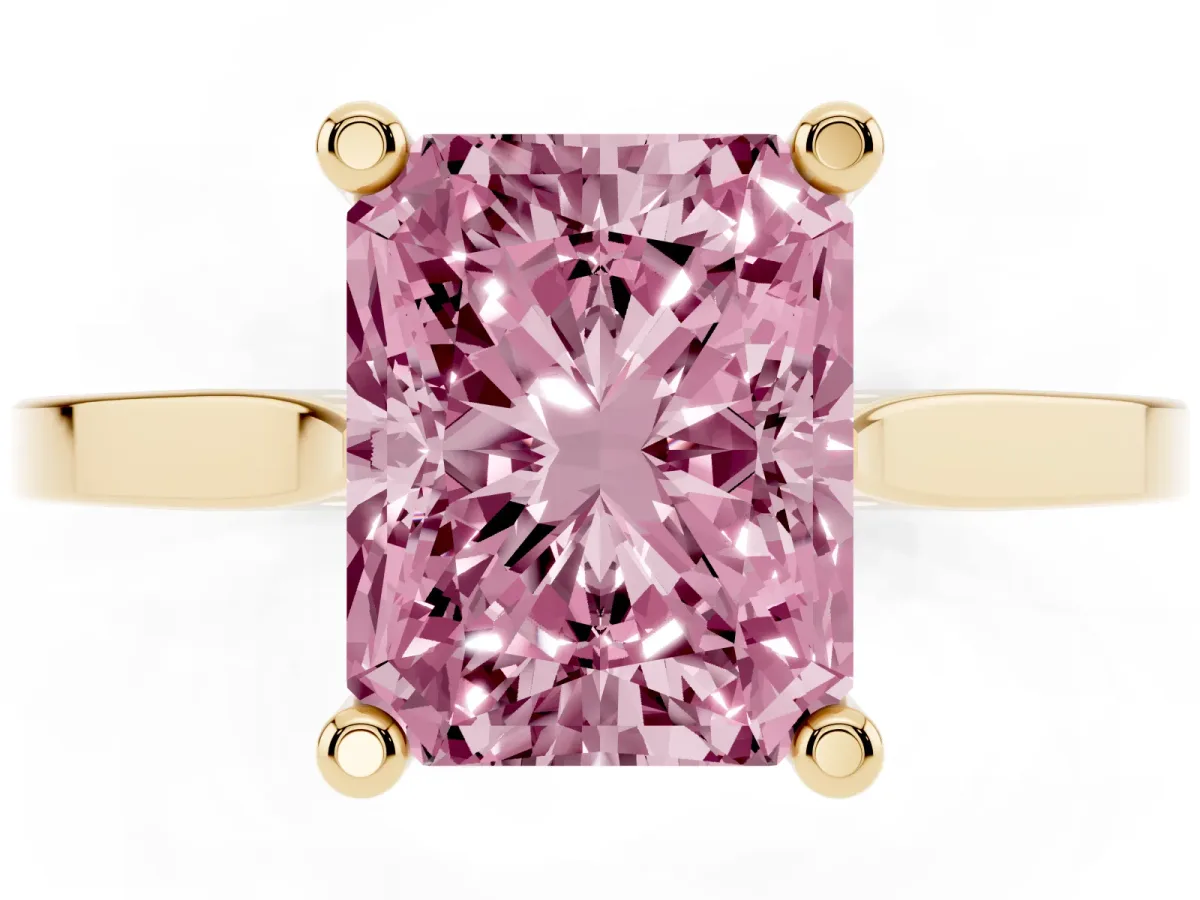 Fancy Pink Radiant Cut Solitaire Diamond Ring with Four-Prong Setting and Tapered Band Yellow gold