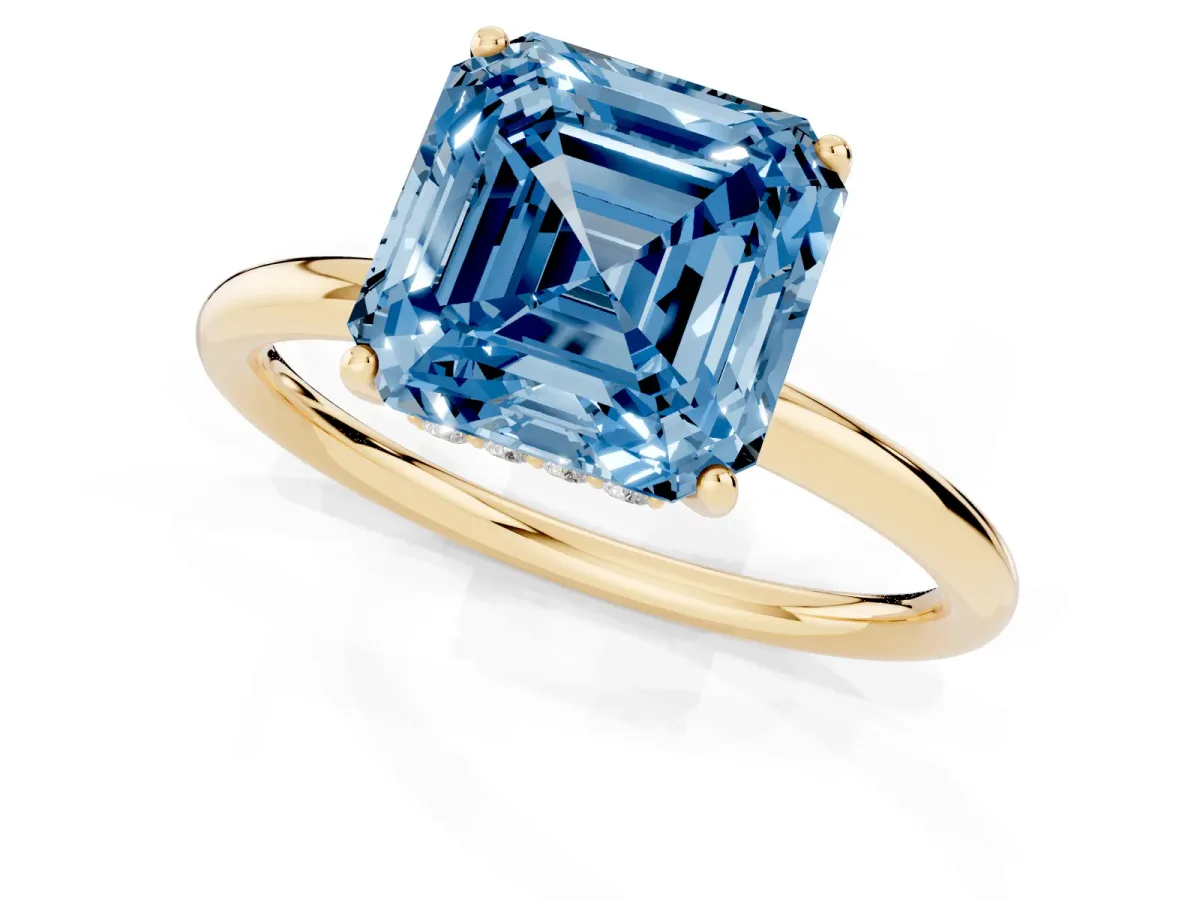Fancy Blue Asscher Cut Solitaire Diamond Ring with a Classic Band and Four-Prong Setting Yellow gold