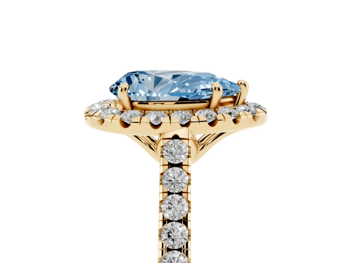 Fancy Blue Pear Cut Halo Pavé Diamond Engagement Ring with Four-Prong Setting Yellow gold