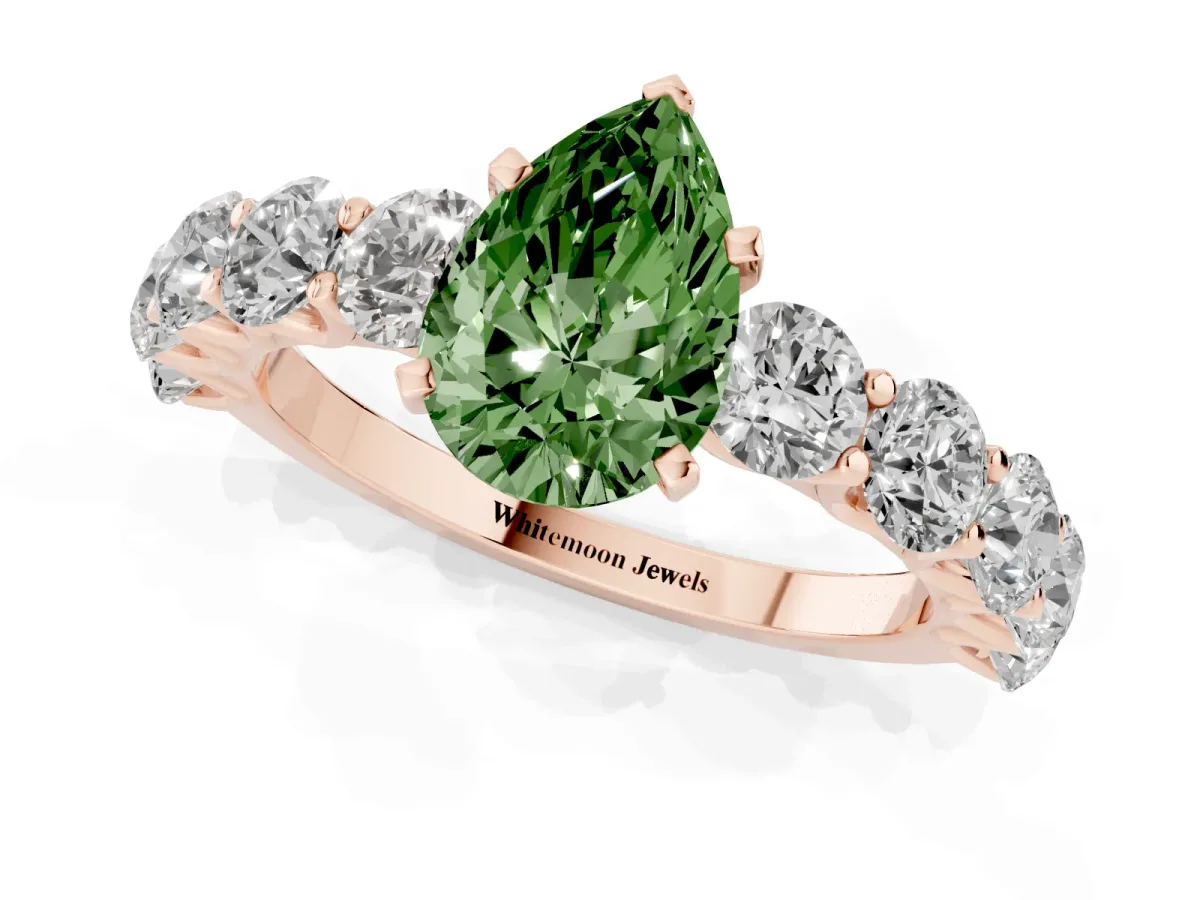 Fancy Green Pear Cut Diamond Prong Setting with Side Stones on a Pave Band Rose gold