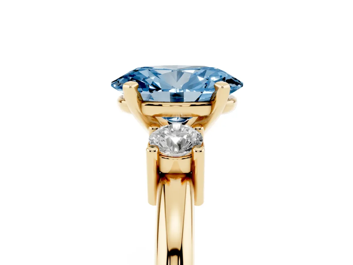 Fancy Blue Three-Stone Oval Cut Cut Diamond Solitaire with Prong Setting and Classic Band Yellow gold