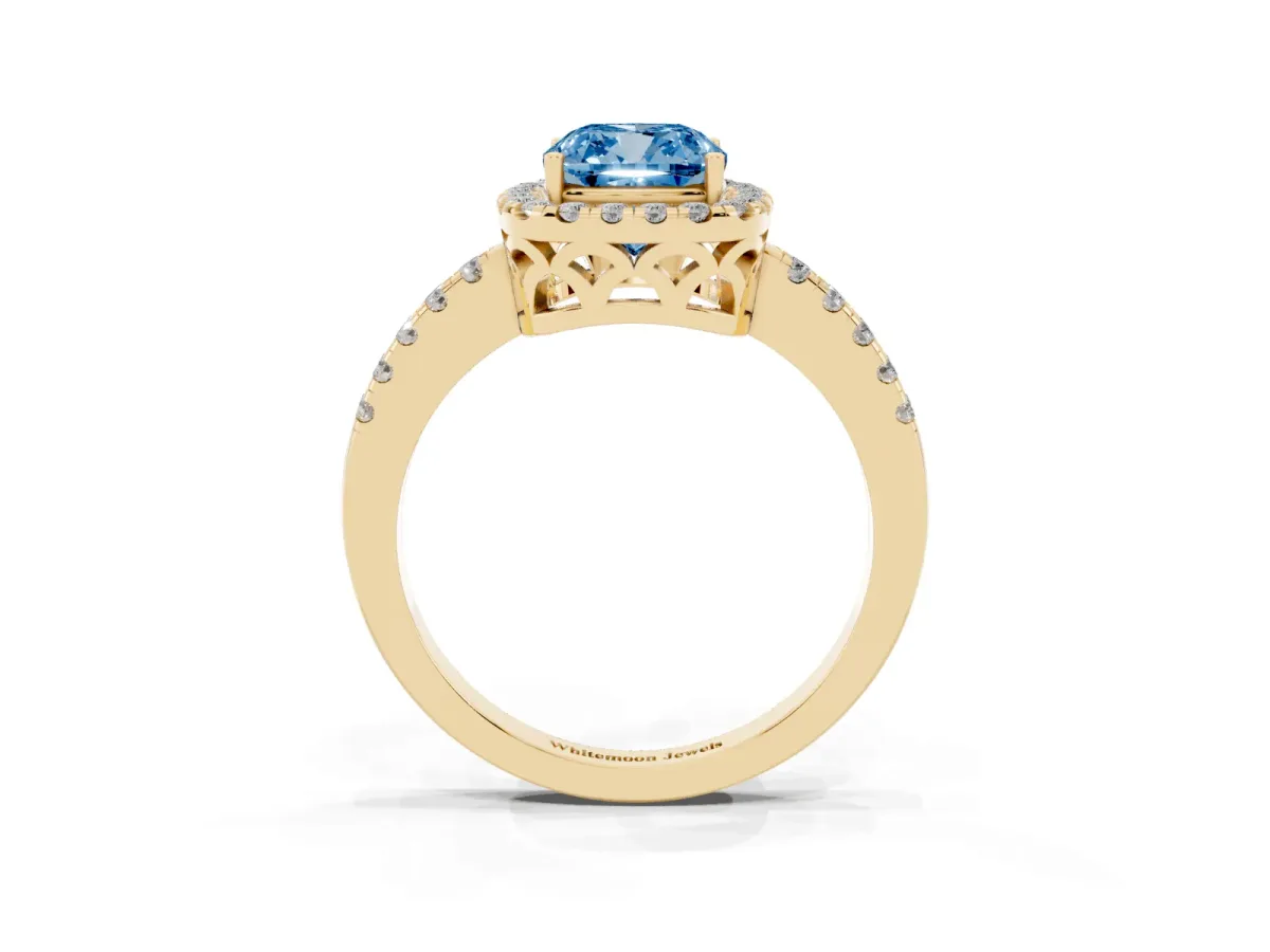 Fancy Blue Cushion Cut Halo Diamond Engagement Ring with Pavé Band and Four-Prong Setting Yellow gold