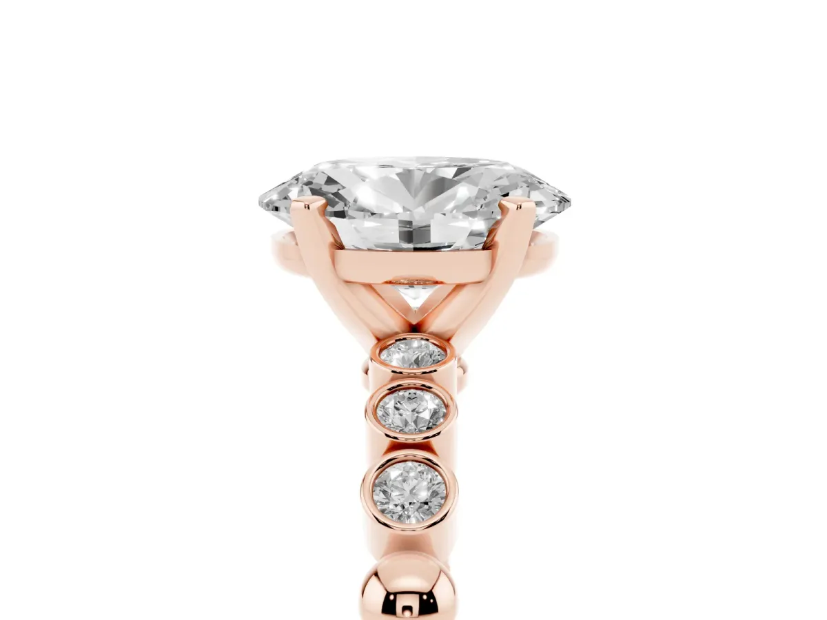Oval Cut Solitaire Bezel Accent Diamond Engagement Ring with Beaded Band and Four-Prong Setting Rose gold