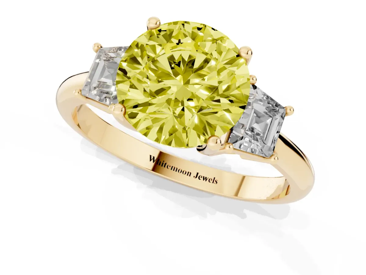 Fancy Yellow Round Cut Diamond Three-Stone Ring with Trapezoid Side Stones and Prong Setting Yellow gold