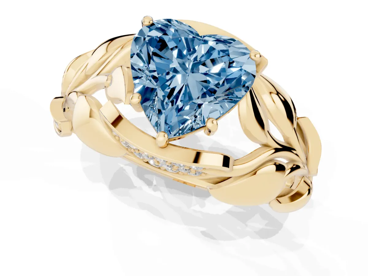 Fancy Blue Heart Cut Diamond Leaf-Inspired Engagement Ring with Round Accents and Prong Setting Yellow gold