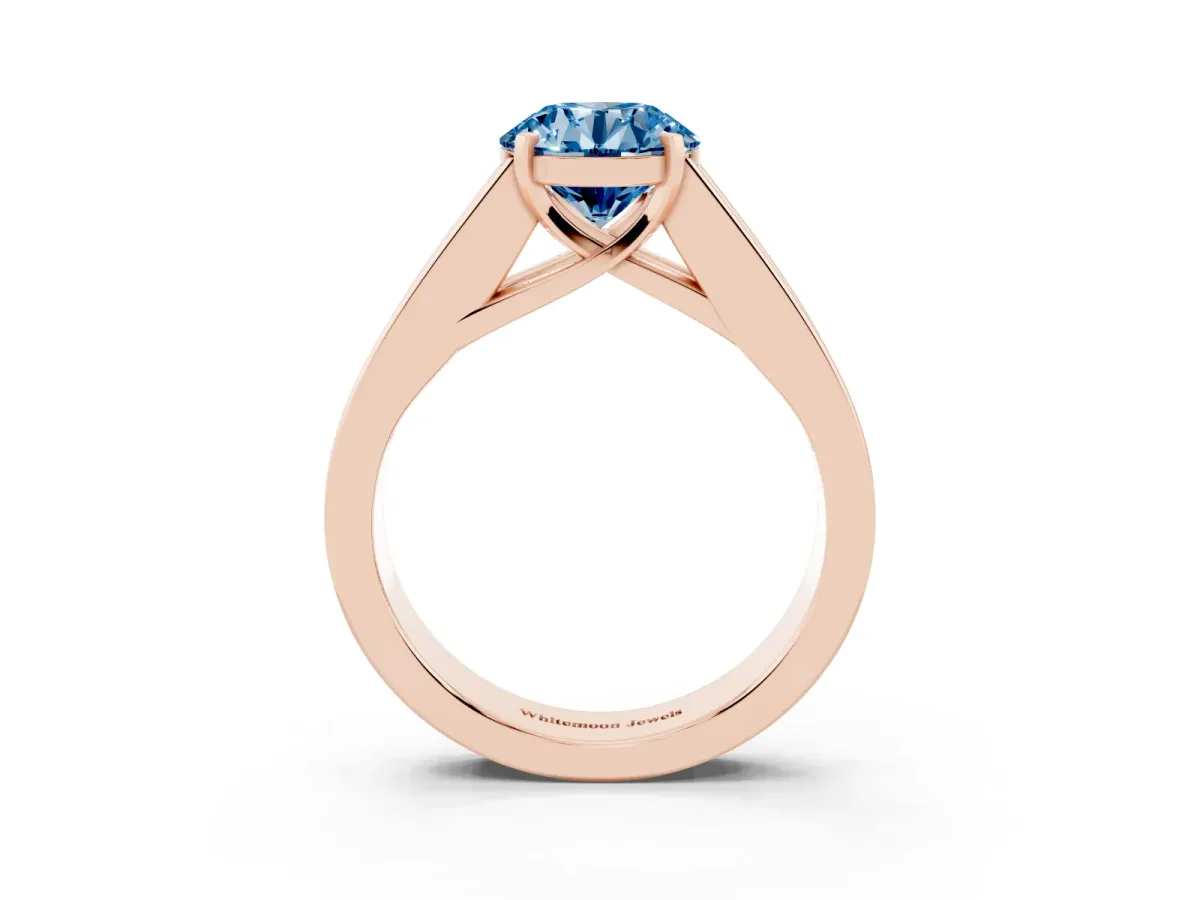 Fancy Blue Round Cut Cut Channel Set Solitaire Ring with Four-Prong Setting Rose gold
