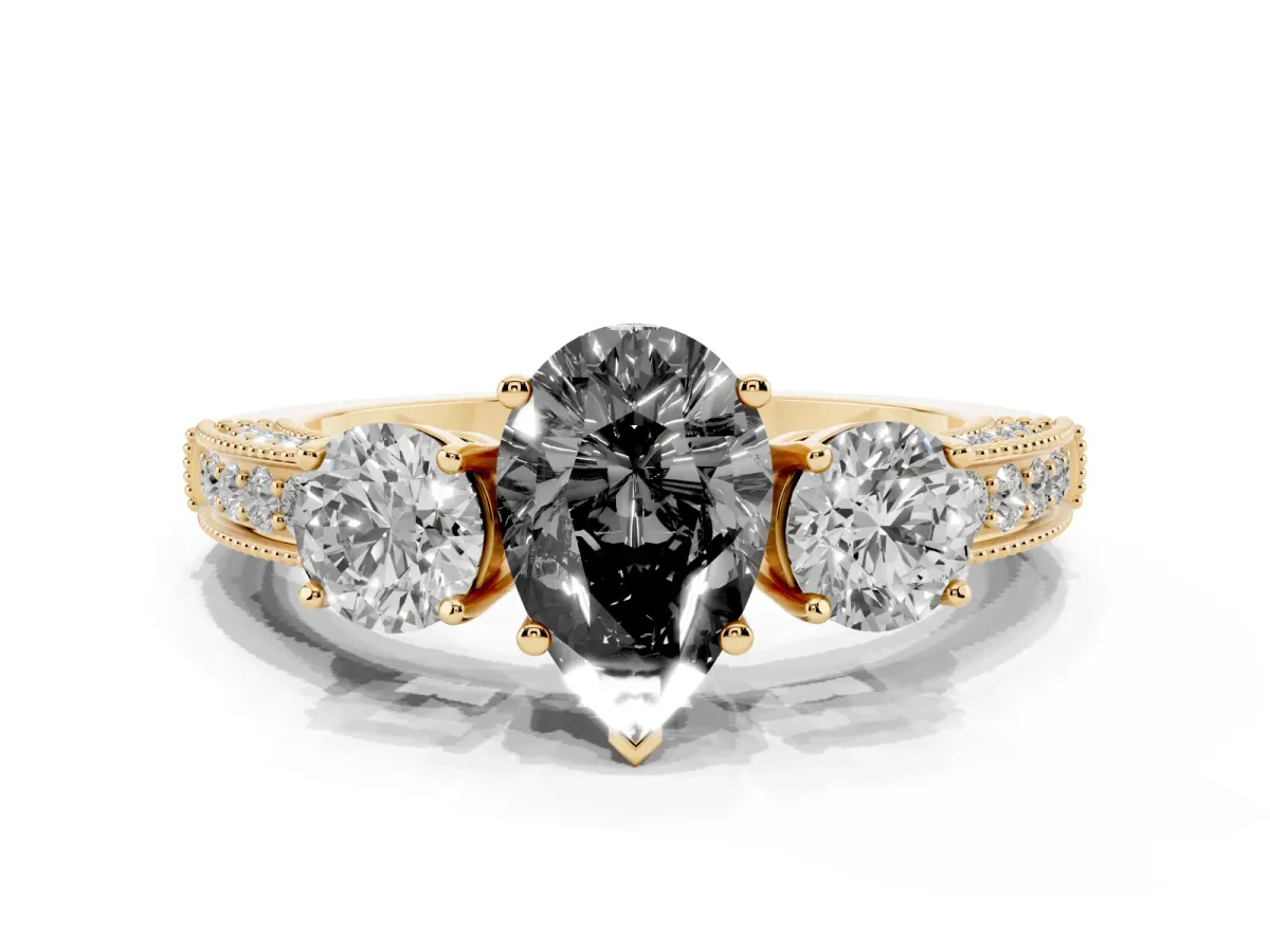 Fancy Black Pear Cut Three-Stone Diamond Ring with Pavé Band and Four-Prong Setting Yellow gold