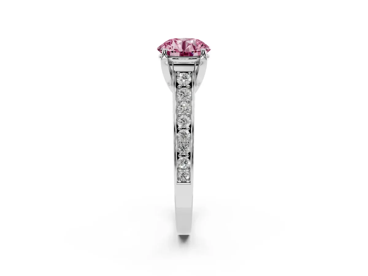 Fancy Pink Round Cut Brilliant Cut Diamond Engagement Ring with Pavé Band and Four-Prong Setting Silver
