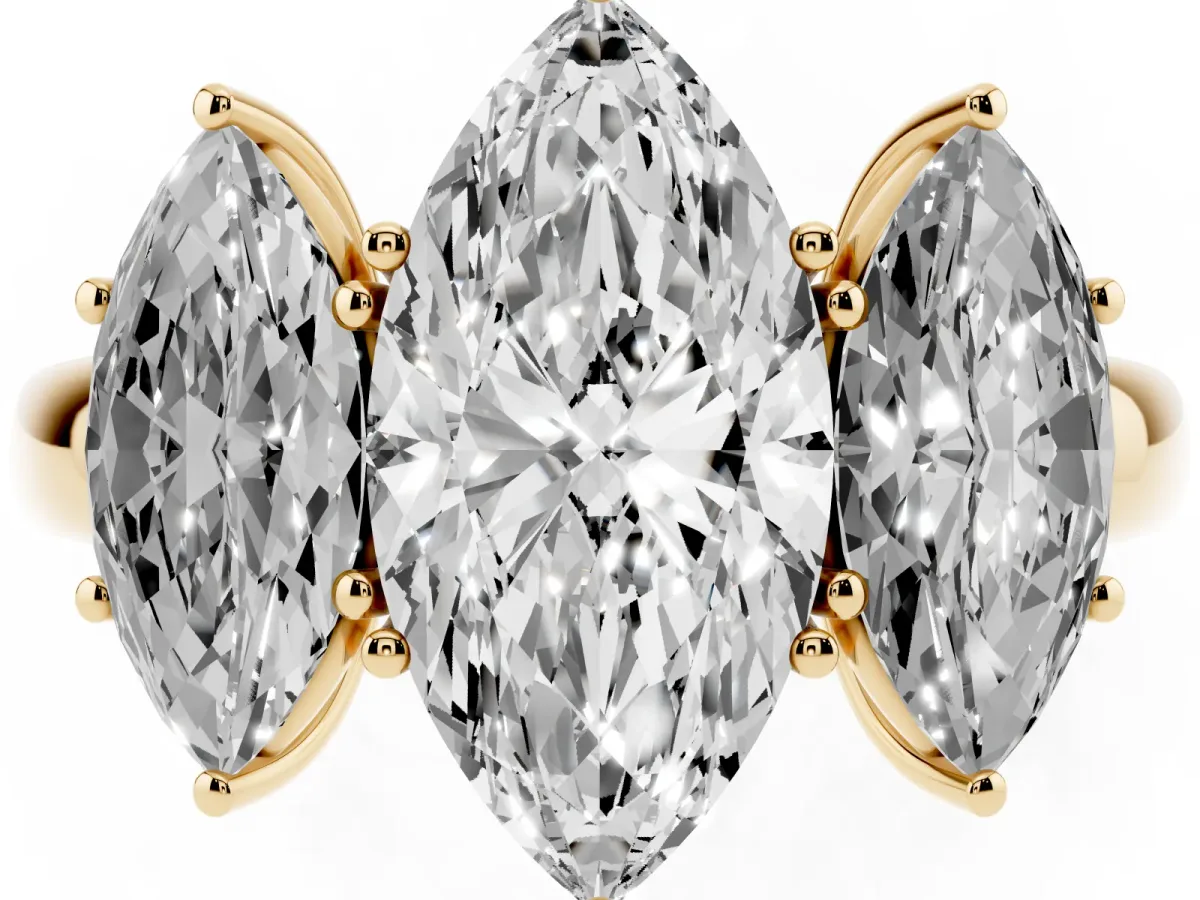 Marquise Cut Diamond Three-Stone Ring with Four-Prong Setting and Classic Band Yellow gold