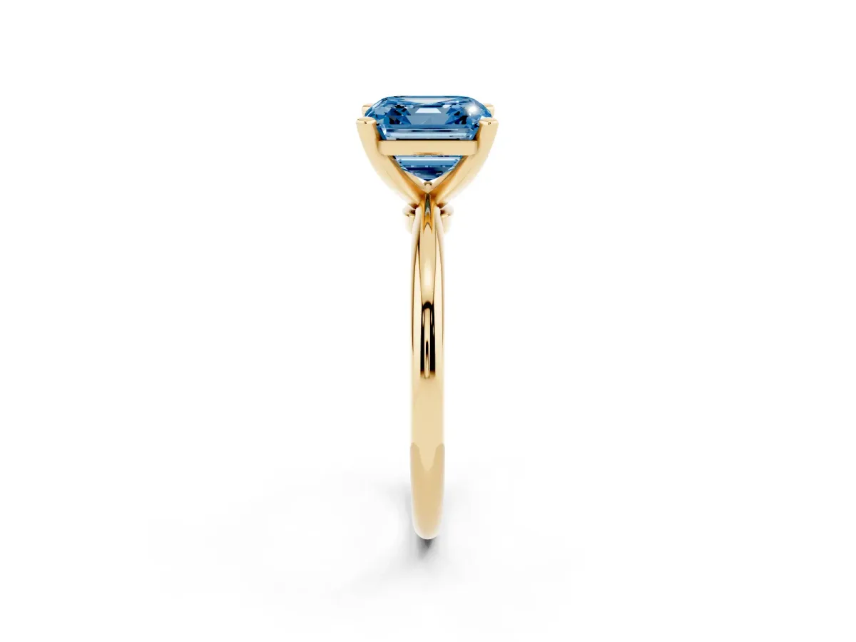 Fancy Blue Asscher Cut Diamond Solitaire Ring with Prong Setting and Classic Band Yellow gold