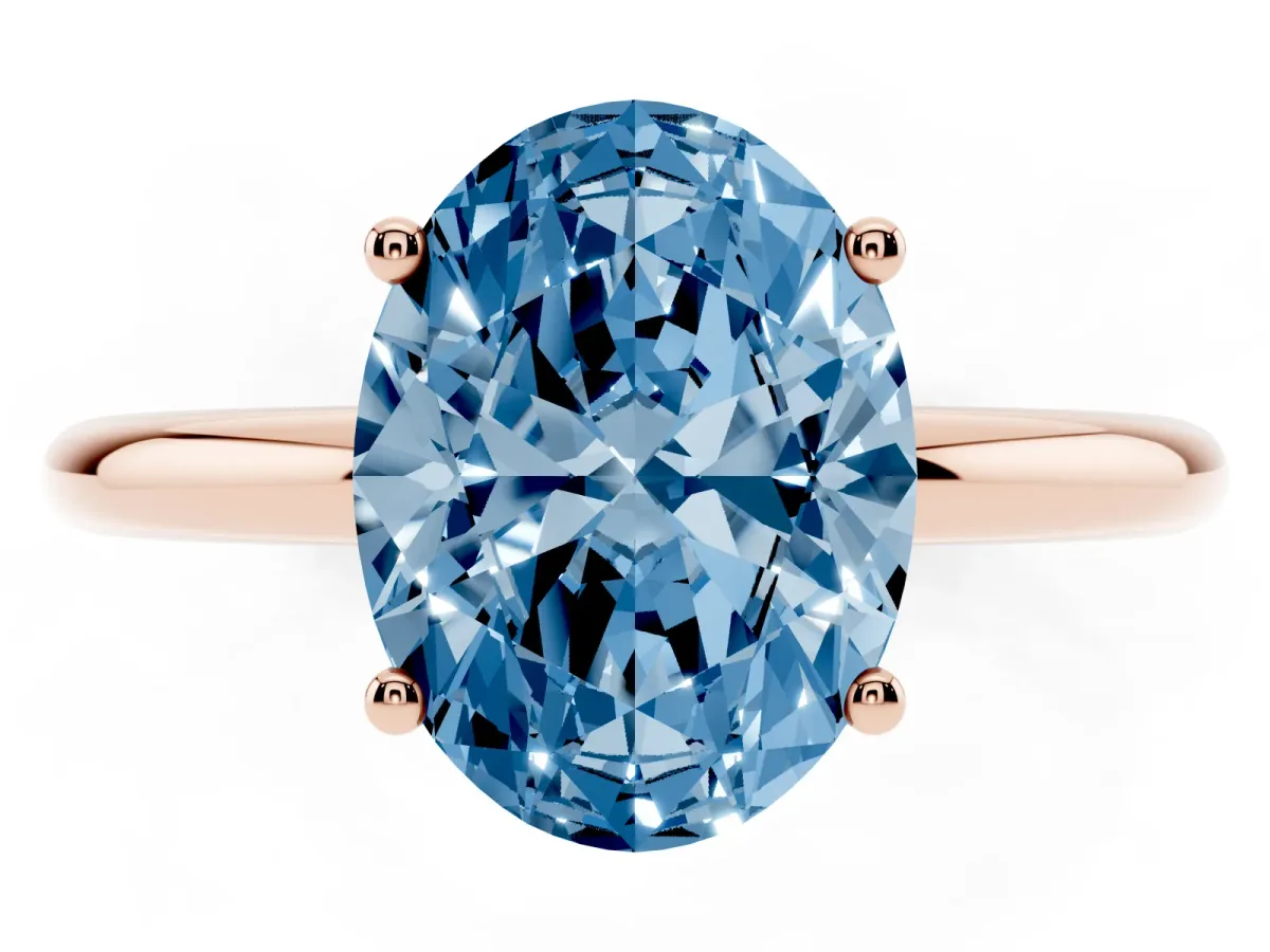 Fancy Blue Oval Cut Cut Solitaire Engagement Ring with Four-Prong Setting and Classic Band Rose gold