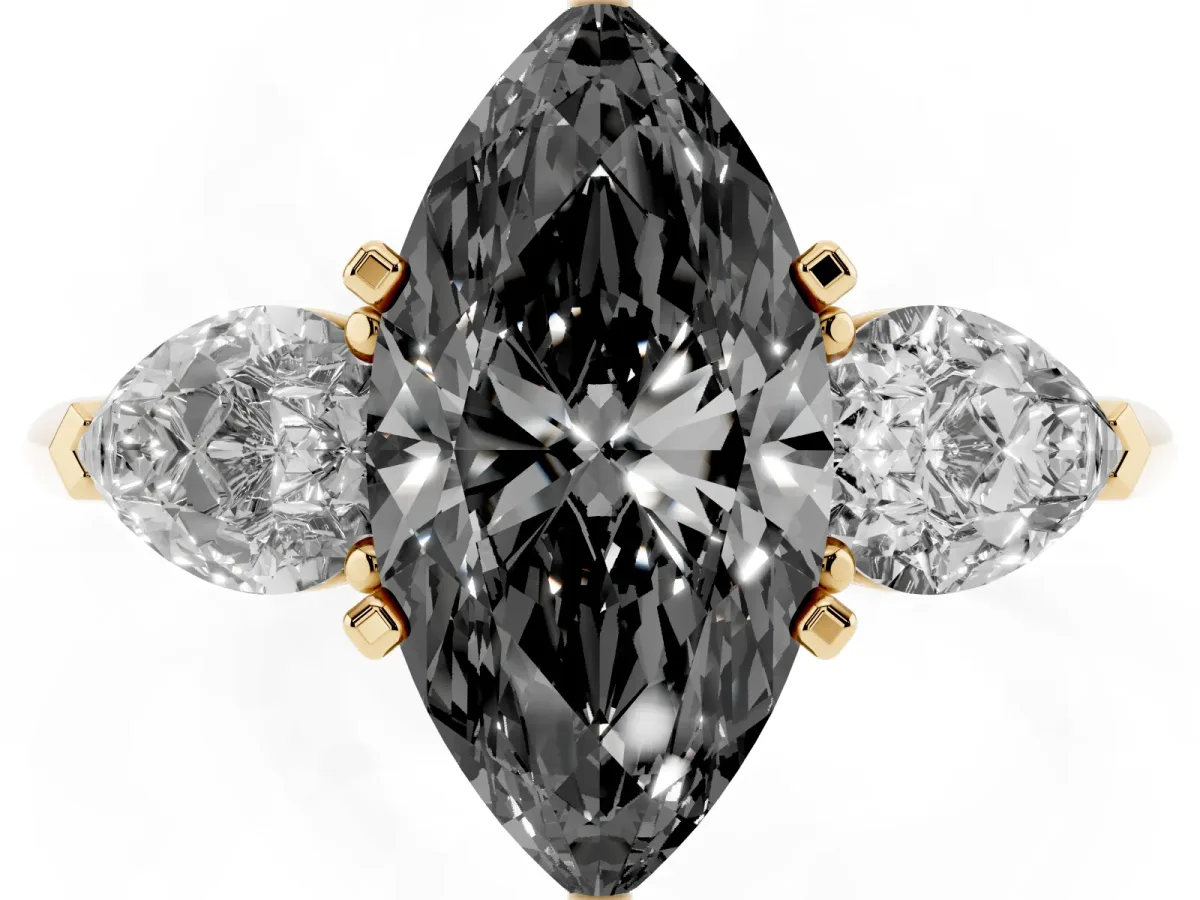 Fancy Black Three-Stone Marquise Cut Diamond Ring with Pear Side Stones and Four-Prong Setting Yellow gold