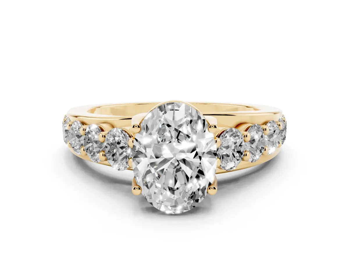 Oval Cut Diamond Engagement Ring with Pavé Band and Four-Prong Setting Yellow gold