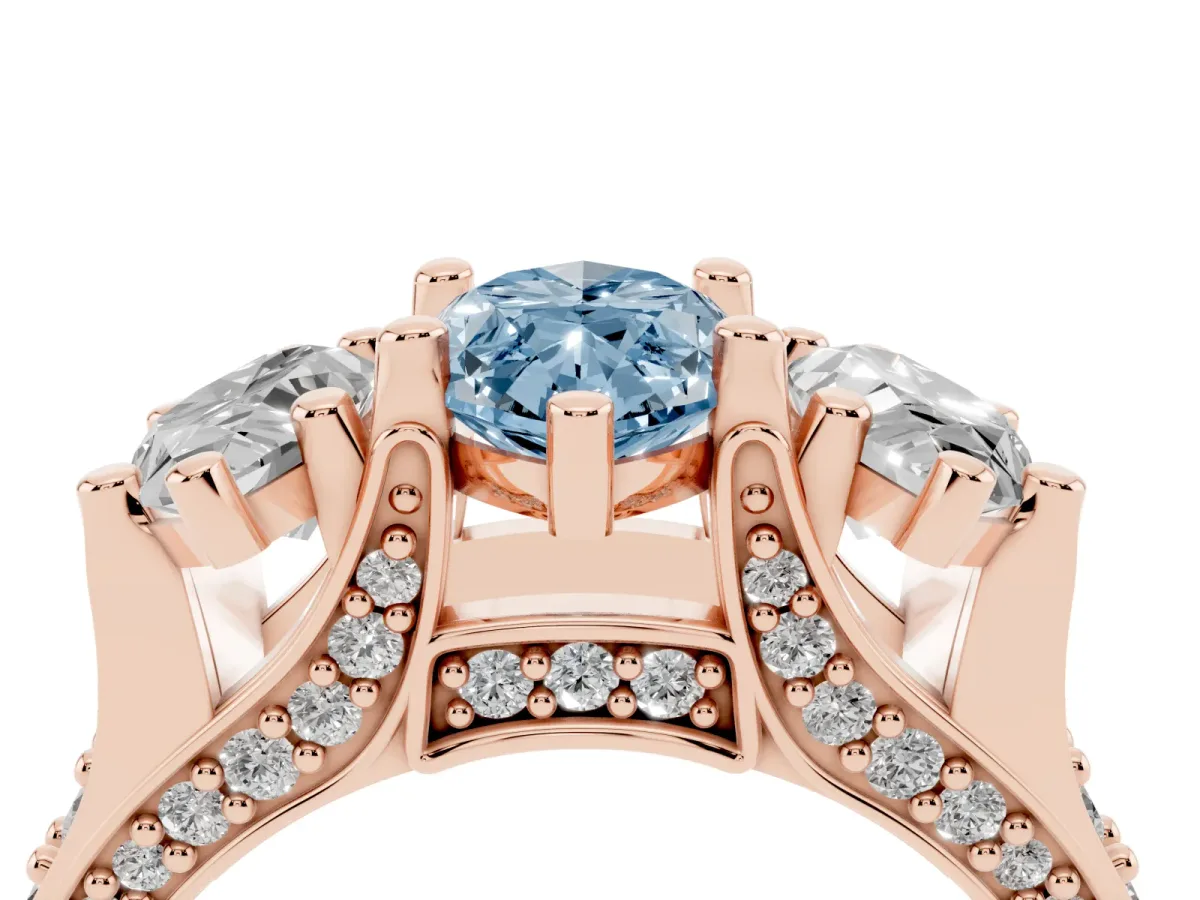 Fancy Blue Marquise Cut Diamond Three-Stone Ring with Channel Set Band and Four-Prong Setting Rose gold