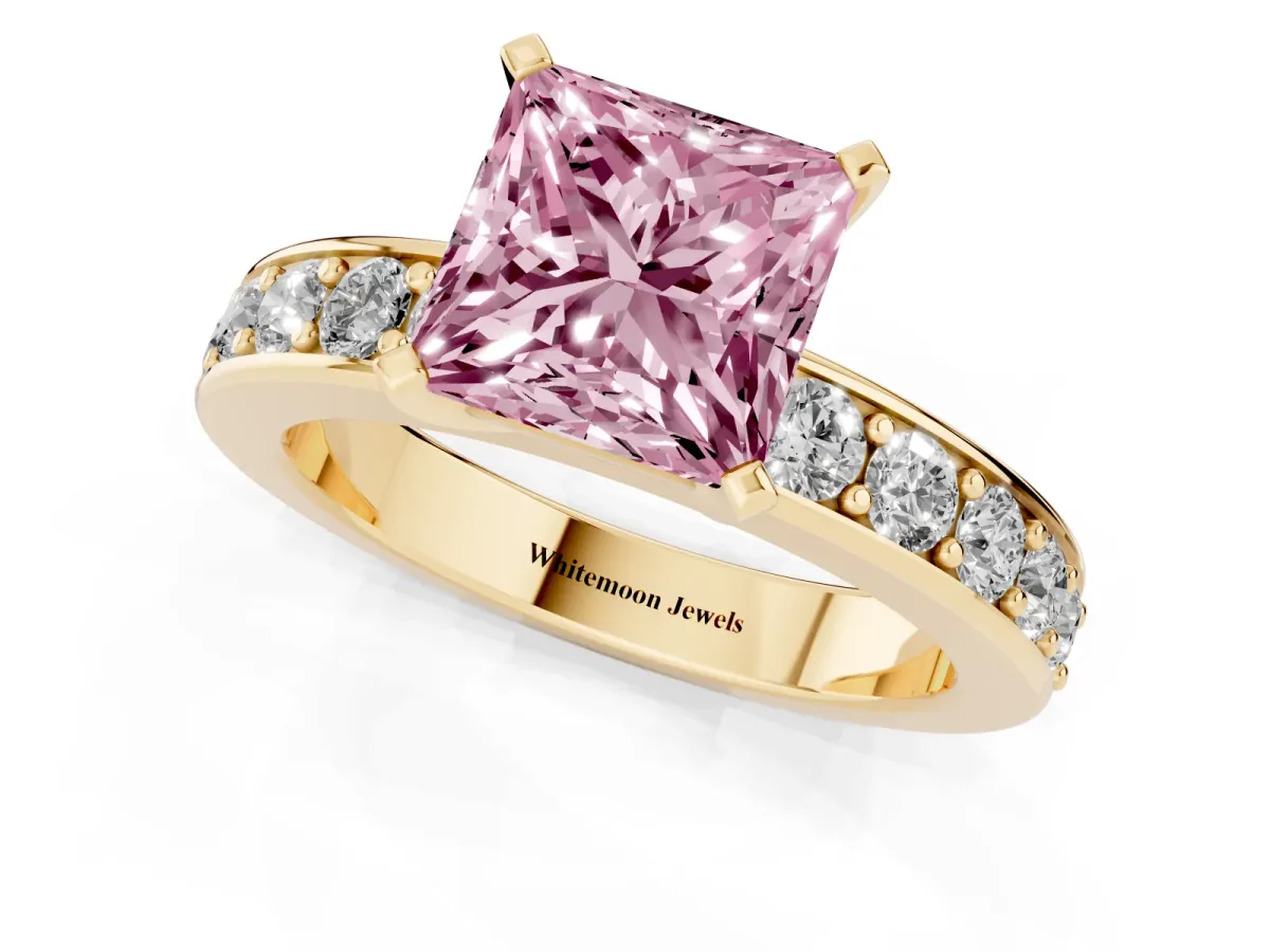 Fancy Pink Princess Cut Diamond Engagement Ring with Channel Set Round Band and Prong Setting Yellow gold