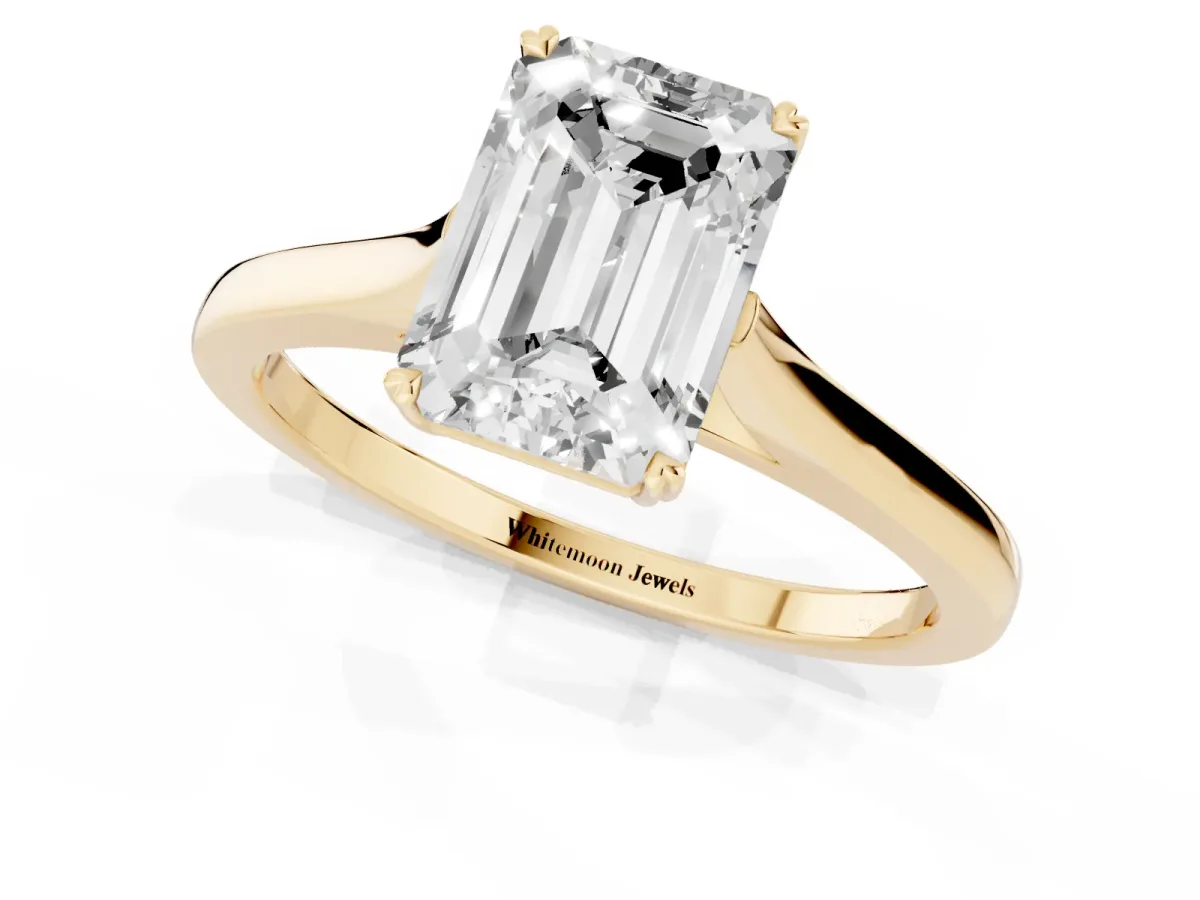 Emerald Cut Solitaire Heart Prong Engagement Ring with Tapered Band Yellow gold