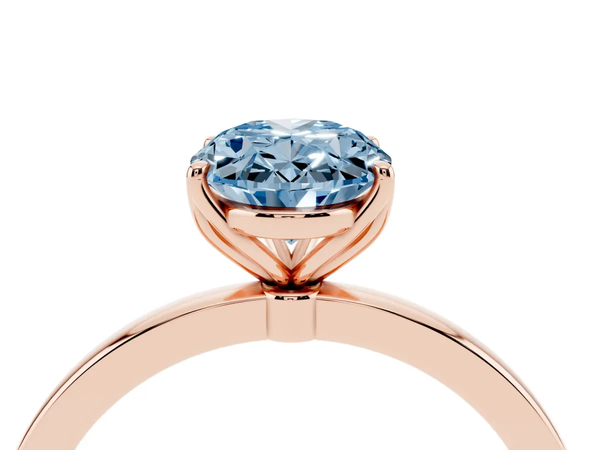 Fancy Blue Oval Cut Diamond Solitaire Ring with Thin Band and Prong Setting Rose gold