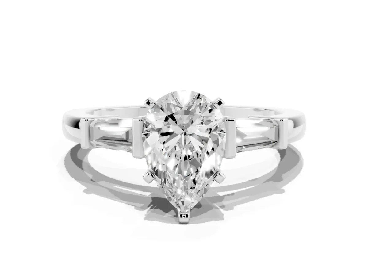 Pear Cut Cut Diamond Solitaire Ring with Tapered Baguette Accents and Four-Prong Setting White gold