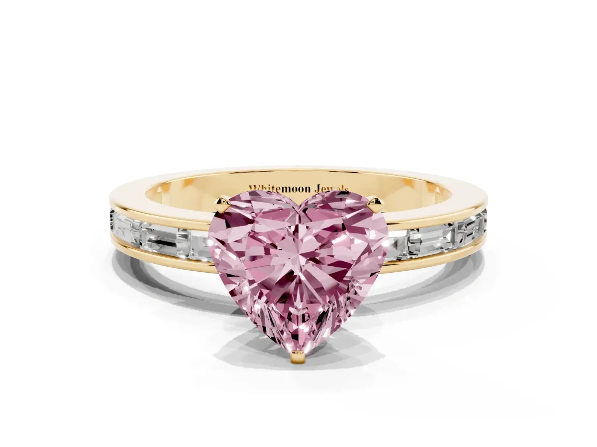 Fancy Pink Heart Cut Solitaire Diamond Ring with Channel-Set Baguette Band and Four-Prong Setting Yellow gold