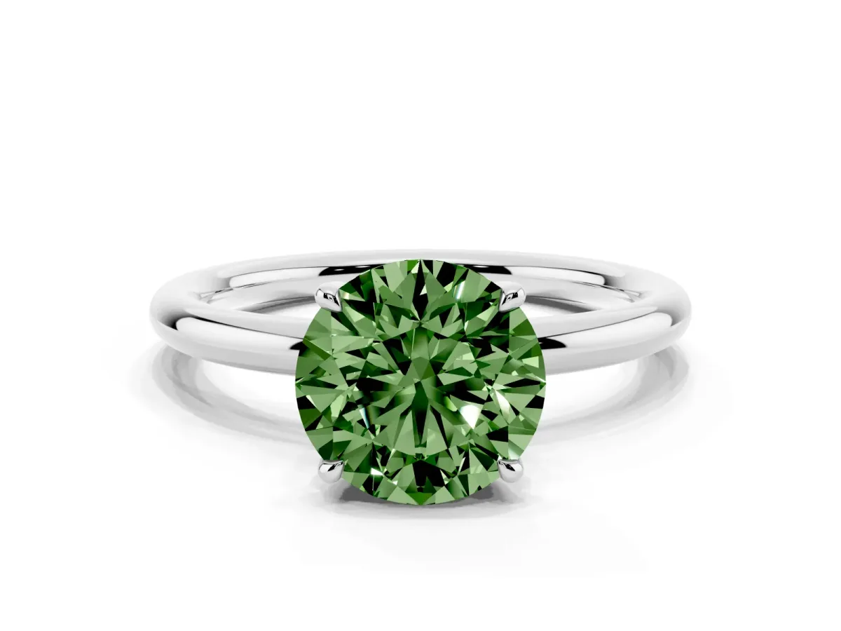 Fancy Green Round Cut Diamond Solitaire Ring with Thin Band and Four-Prong Setting Silver