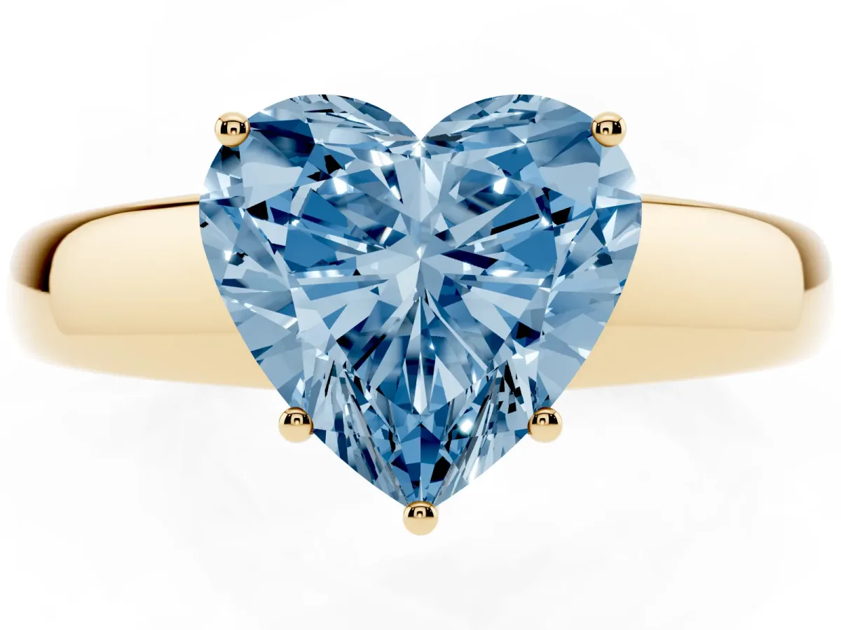 Fancy Blue Heart Cut Solitaire Diamond Ring with Tapered Band and Four-Prong Setting Yellow gold