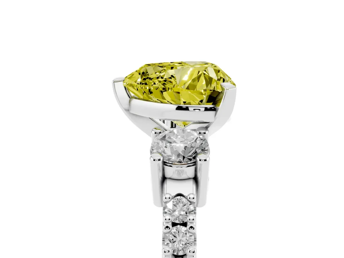 Fancy Yellow Heart Cut Three-Stone Diamond Pavé Band with Prong Setting Platinum