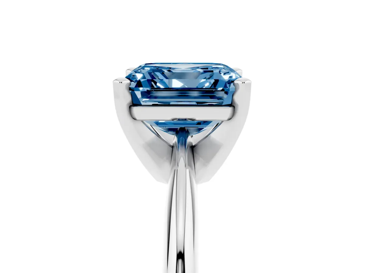 Fancy Blue Asscher Cut Cut Solitaire Ring with Four-Prong Setting on a Classic Band Platinum