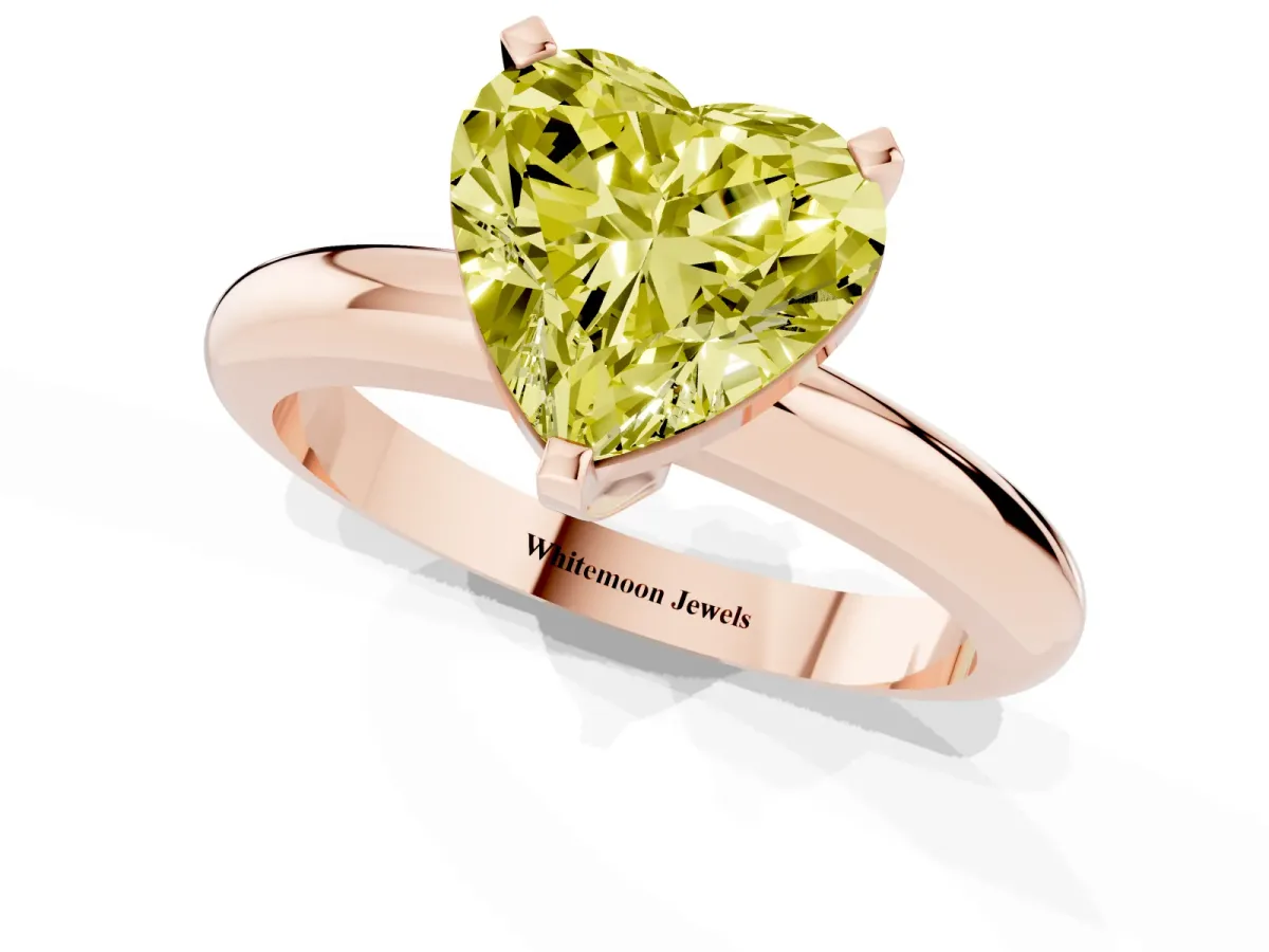 Fancy Yellow Heart Cut Diamond Solitaire Engagement Ring with Round Band and Four-Prong Setting Rose gold