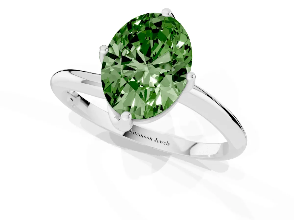 Fancy Green Oval Cut Diamond Solitaire Engagement Ring with Four-Prong Setting and Classic Band Platinum