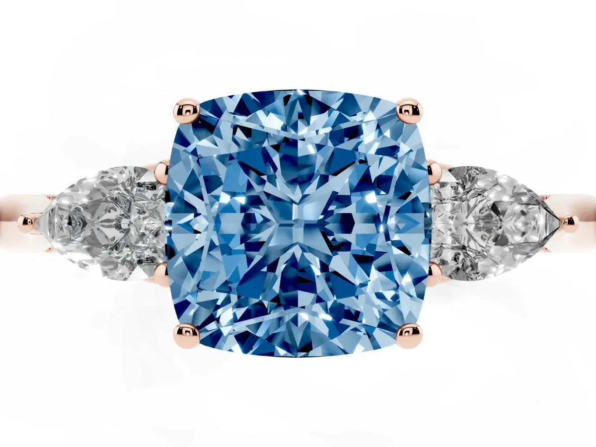 Fancy Blue Three-Stone Cushion Cut Brilliant Diamond Solitaire Ring with Tapered Band and Four-Prong Setting Rose gold