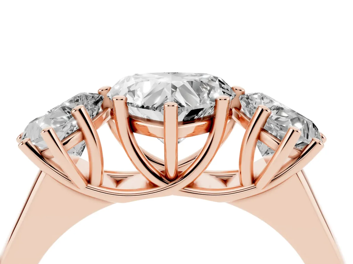 Heart Cut Three-Stone Diamond Ring with Prong Setting on a Classic Band Rose gold