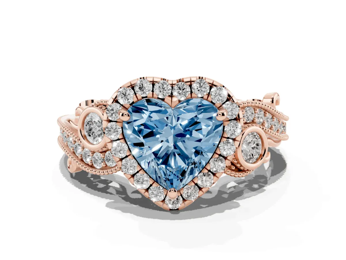 Fancy Blue Heart Cut Halo Diamond Ring with Milgrain and Bezel Accents on a Split Shank Band Rose gold