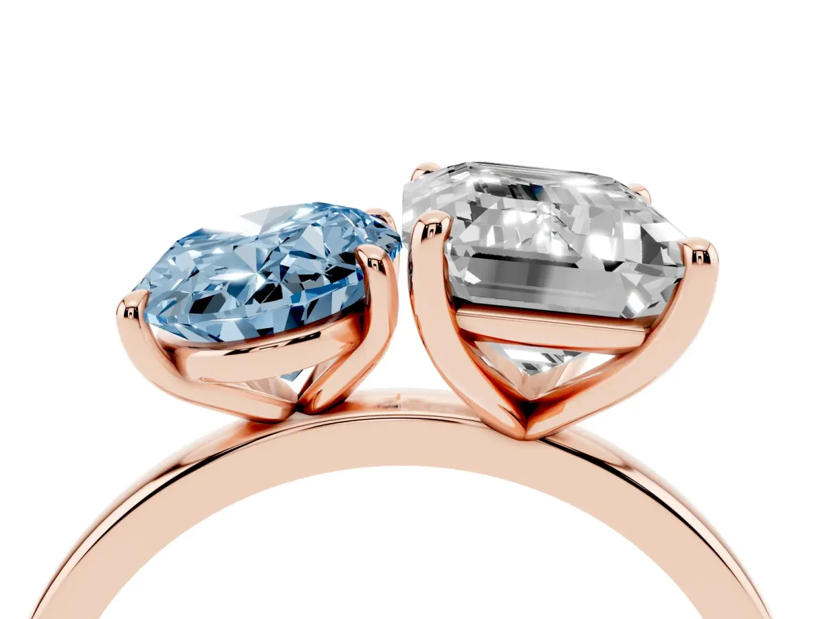 Fancy Blue Oval Cut and Emerald Cut Toi Moi Ring with Prong Setting Rose gold