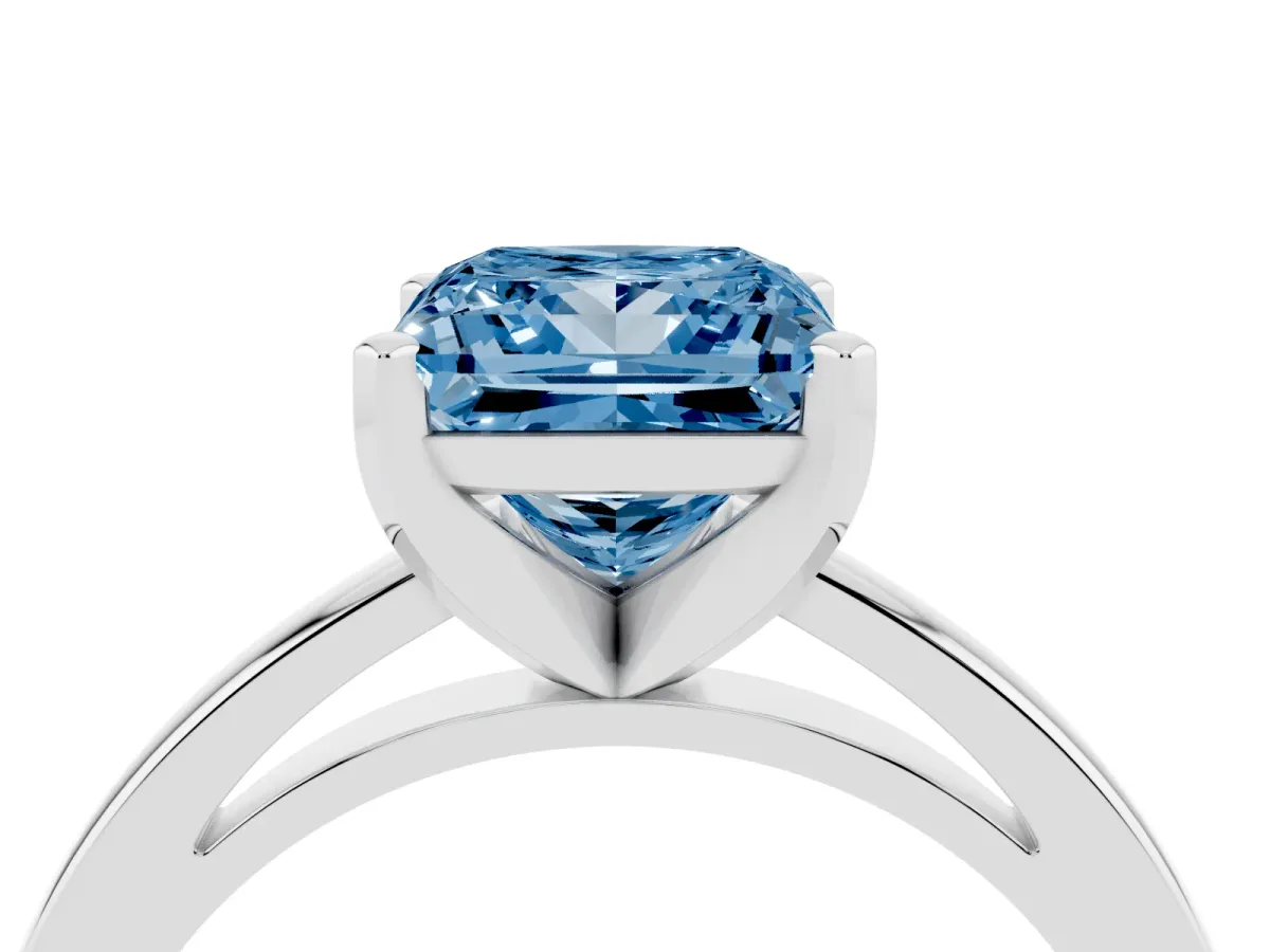 Fancy Blue Princess Cut Solitaire Diamond Engagement Ring with Four-Prong Setting on a Classic Band Silver