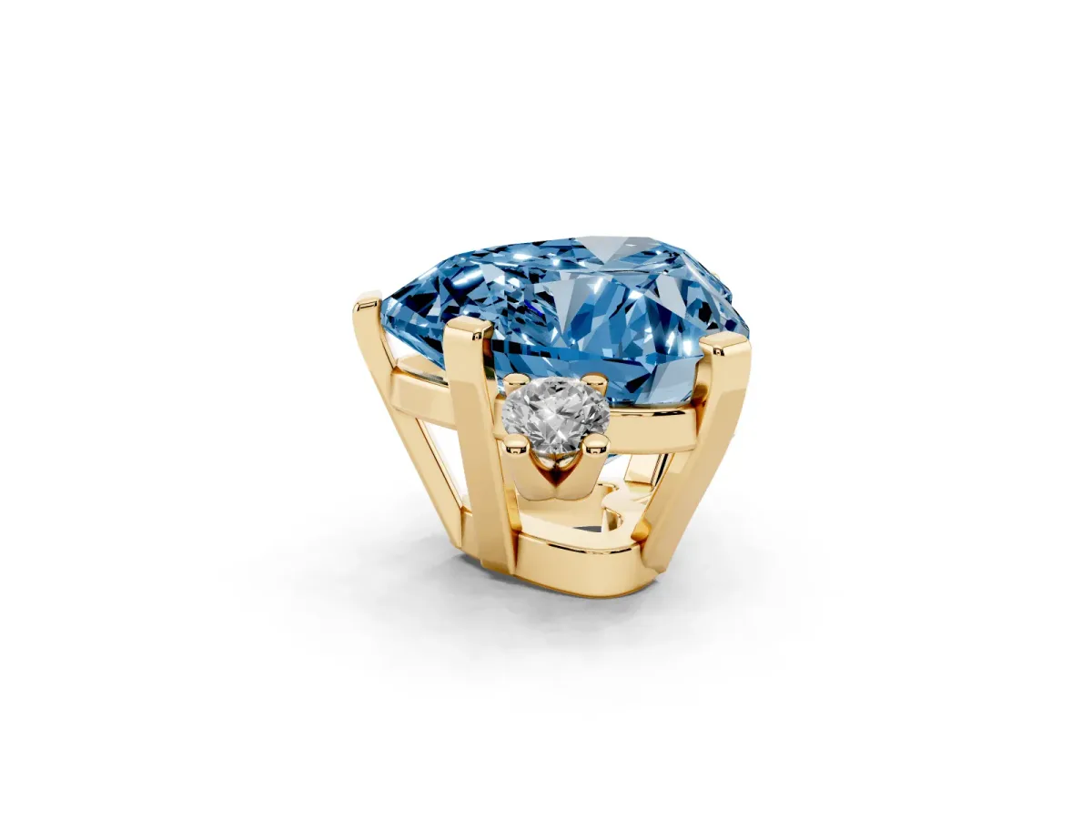 Fancy Blue Heart Cut Cut Three-Stone Solitaire Ring with Round Accent Diamonds and Four-Prong Setting Yellow gold