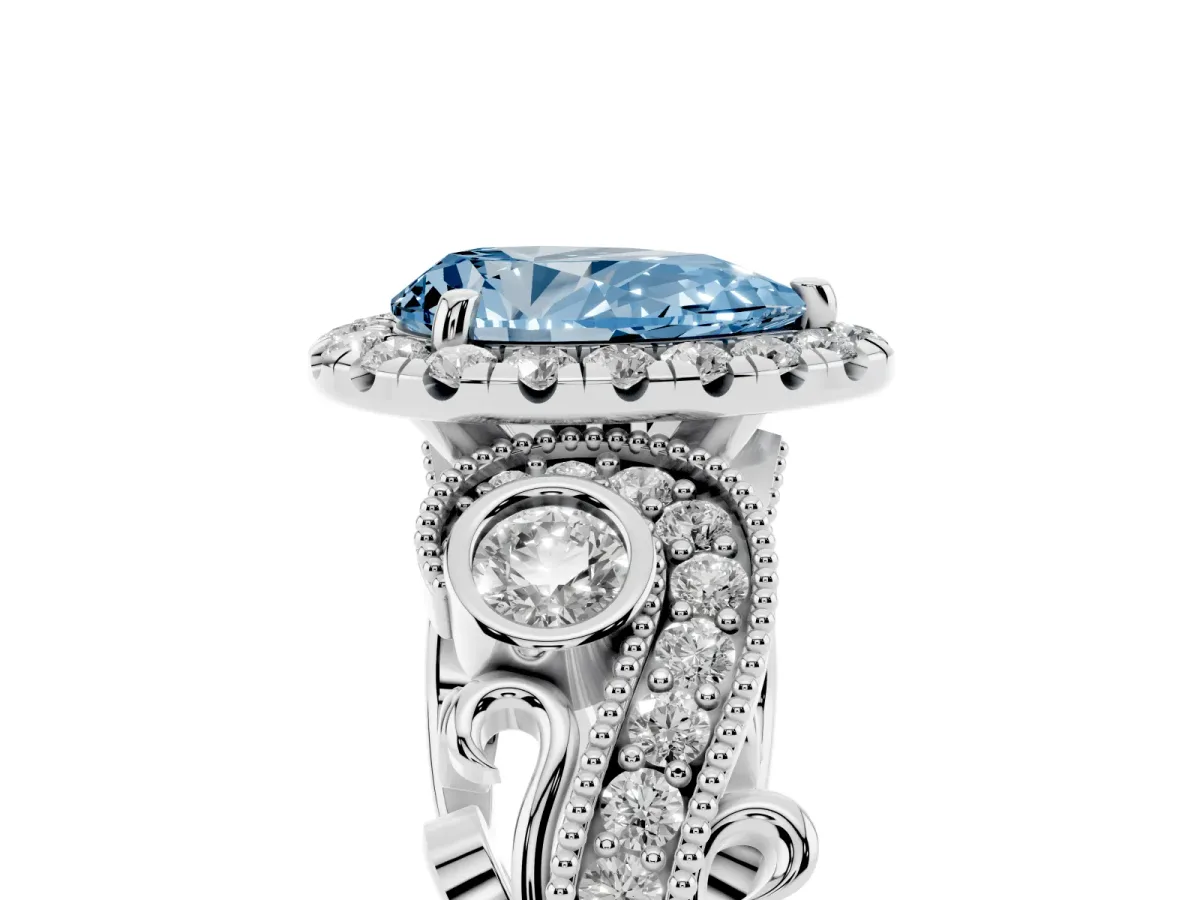 Fancy Blue Pear Cut Halo Diamond Ring with Milgrain and Bezel Accents on a Split Shank Band White gold