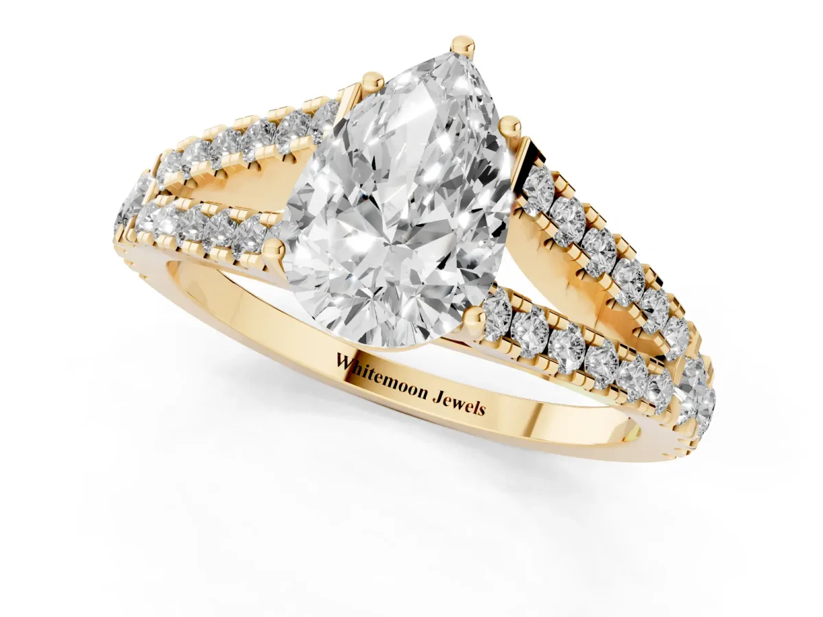 Pear Cut Diamond Split Shank Pavé Engagement Ring with Four-Prong Setting Yellow gold