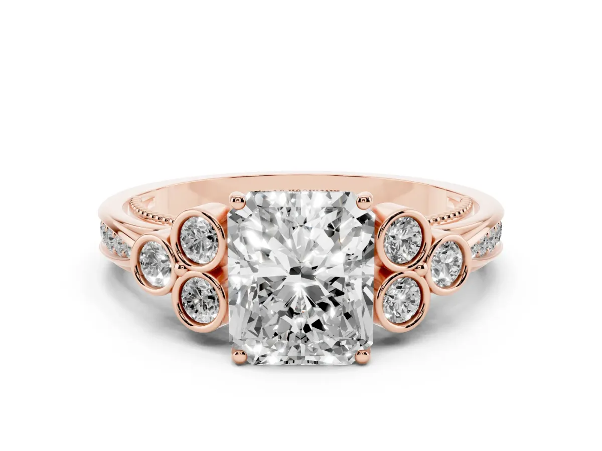 Radiant Cut Cut Diamond Engagement Ring with Bezel Set Round Side Stones and Prong Setting Rose gold