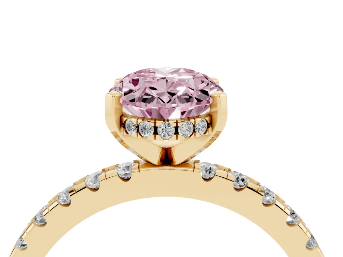 Fancy Pink Oval Cut Diamond Solitaire Ring with Round Pavé Band and Four-Prong Setting Yellow gold