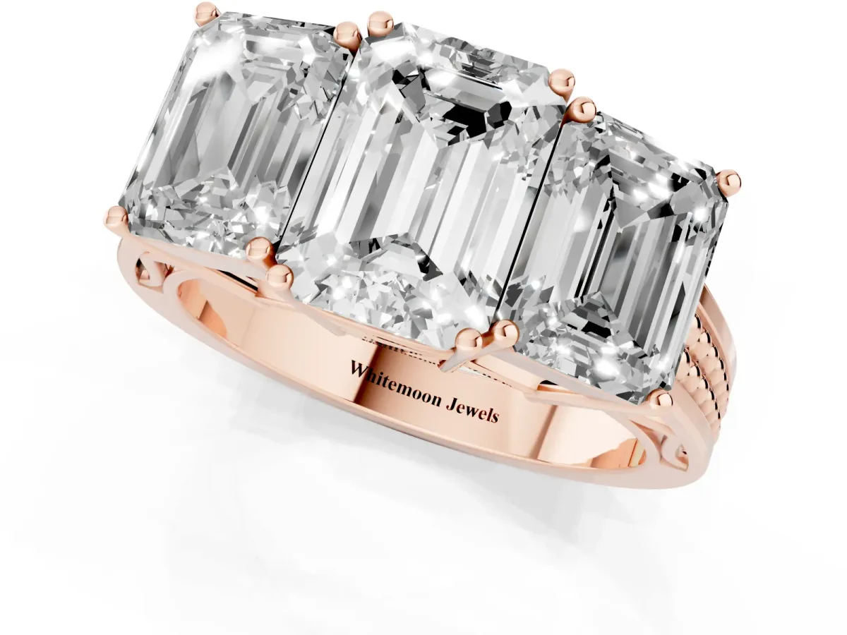 Emerald Cut Diamond Three-Stone Ring with Prong Setting and Textured Band Rose gold