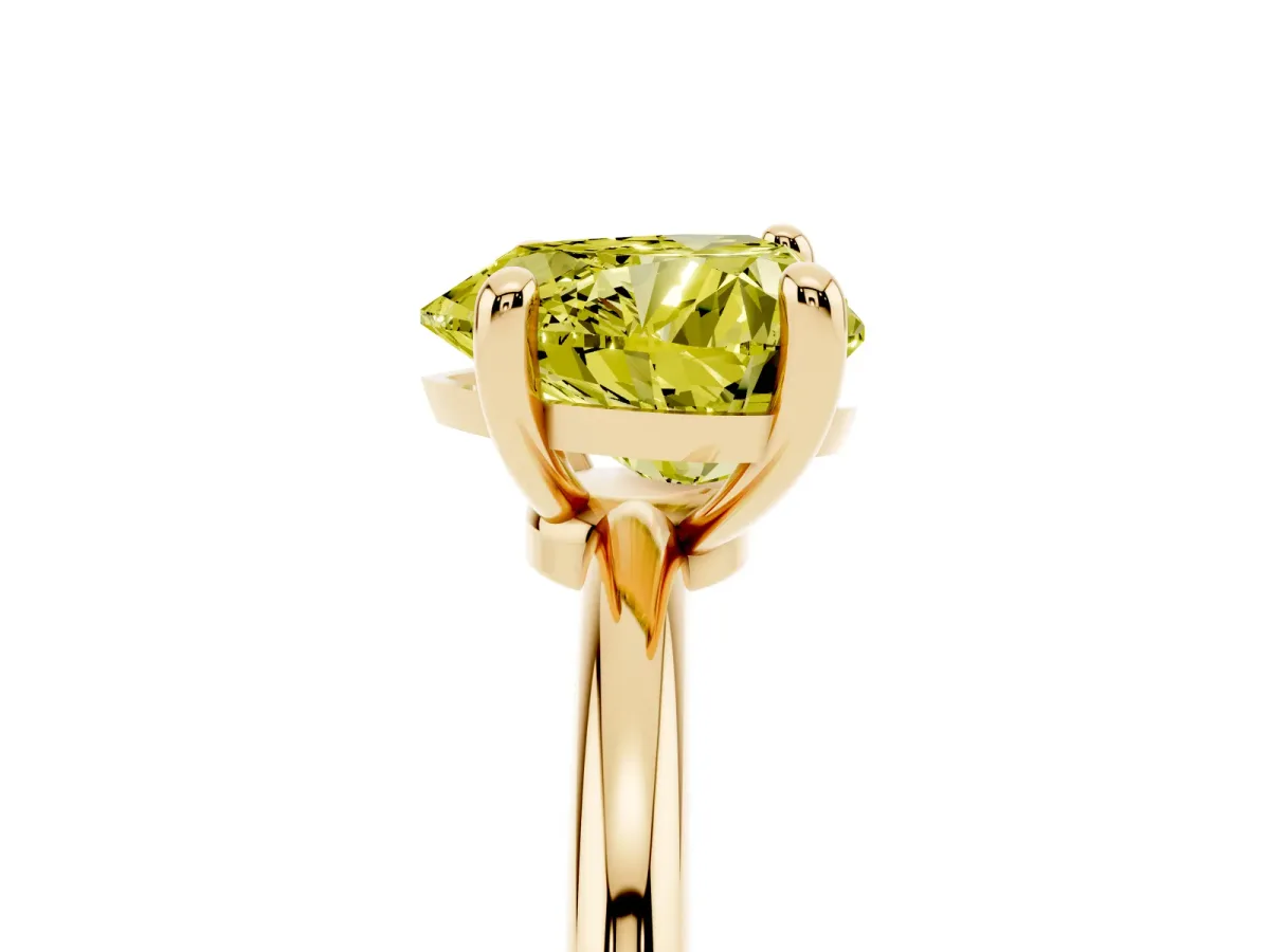 Fancy Yellow Heart Cut Solitaire Diamond Ring with 4-Prong Setting on a Classic Band Yellow gold