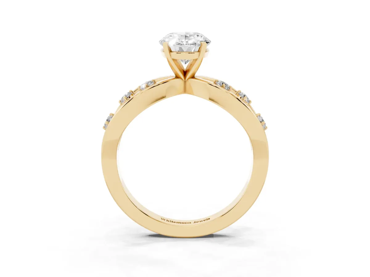 Oval Cut Cut Solitaire Diamond with Side Stones on Criss-Cross Band and Four-Prong Setting Yellow gold