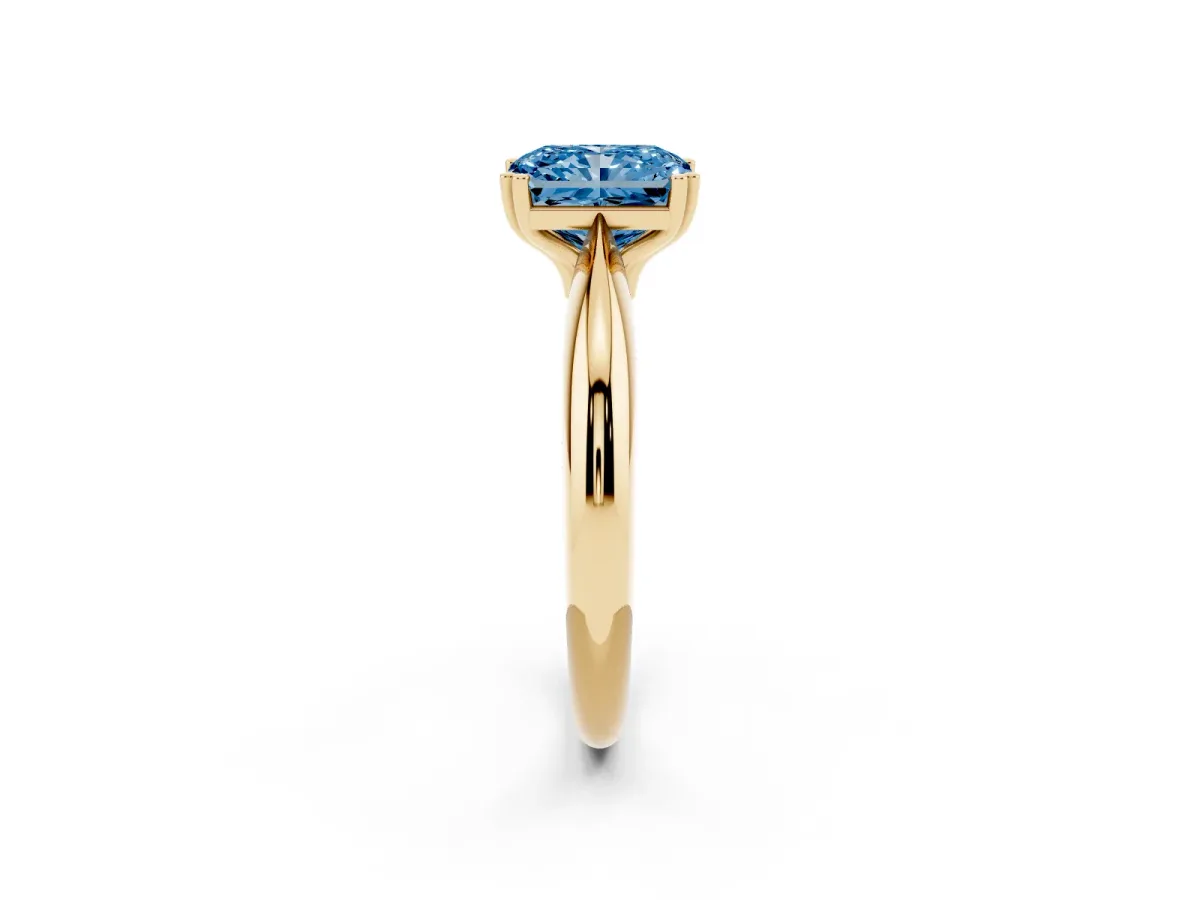 Fancy Blue Radiant Cut Cut Solitaire Engagement Ring with Tapered Band and Four-Prong Setting Yellow gold
