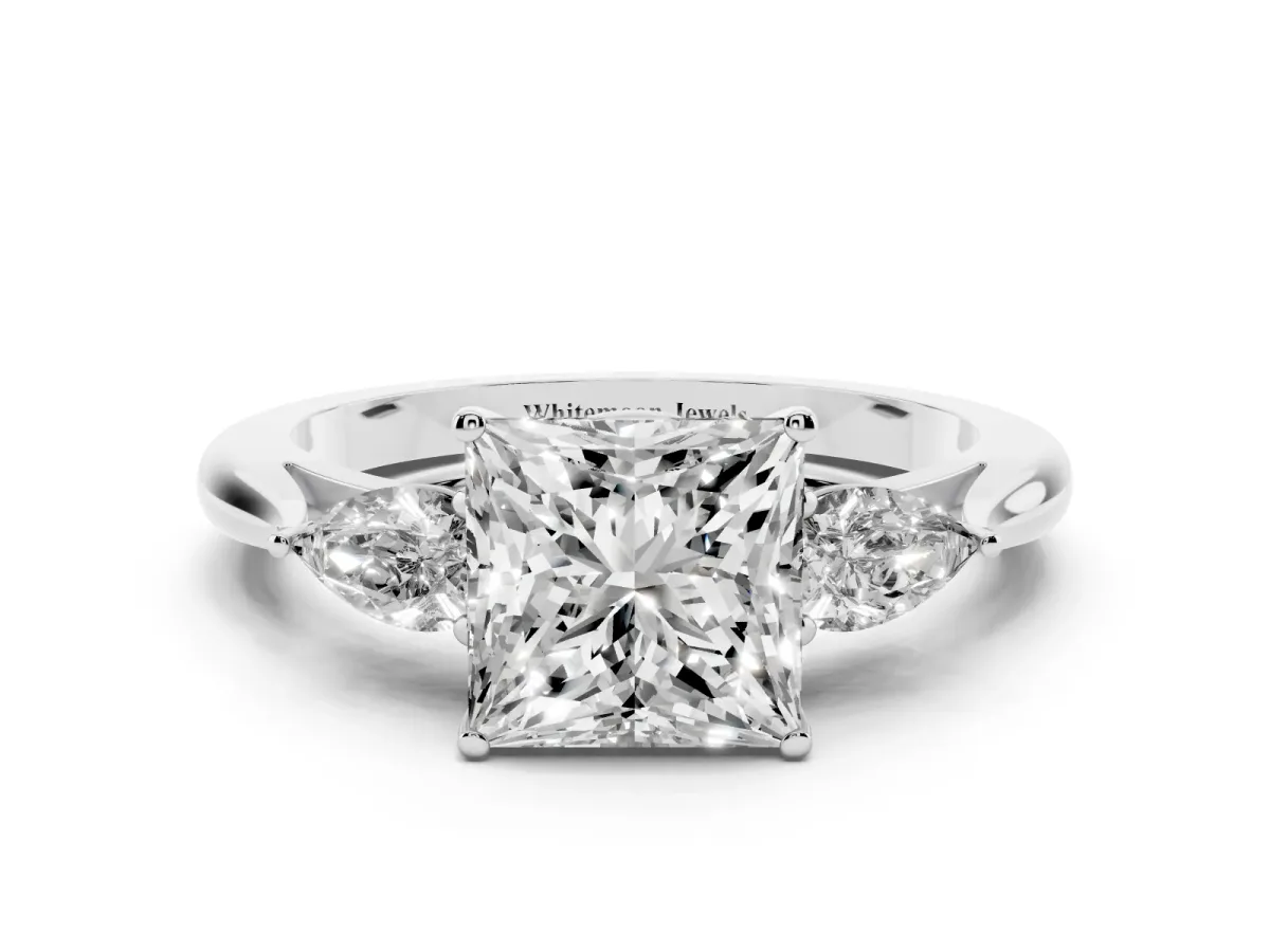 Princess Cut Diamond Three-Stone Ring with Pear Side Stones and Prong Setting Platinum