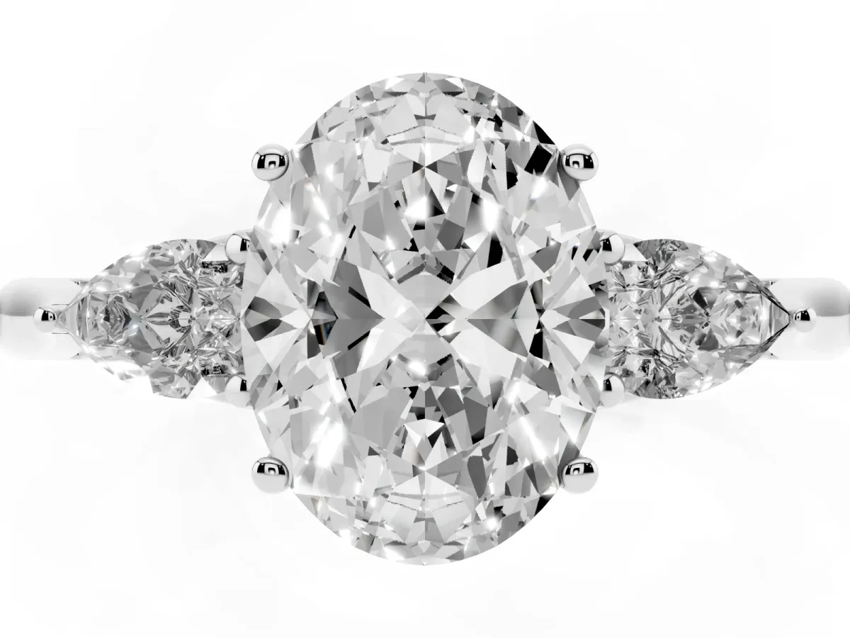 Three-Stone Oval Cut Brilliant Diamond Solitaire Ring with Tapered Band and Four-Prong Setting Silver