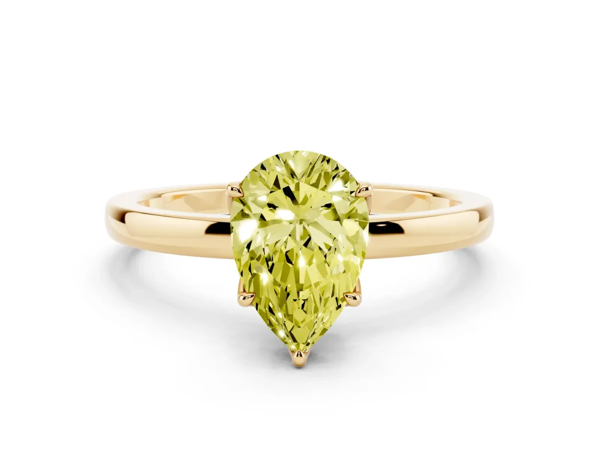 Fancy Yellow Pear Cut Diamond Solitaire Ring with Thin Band and Prong Setting Yellow gold